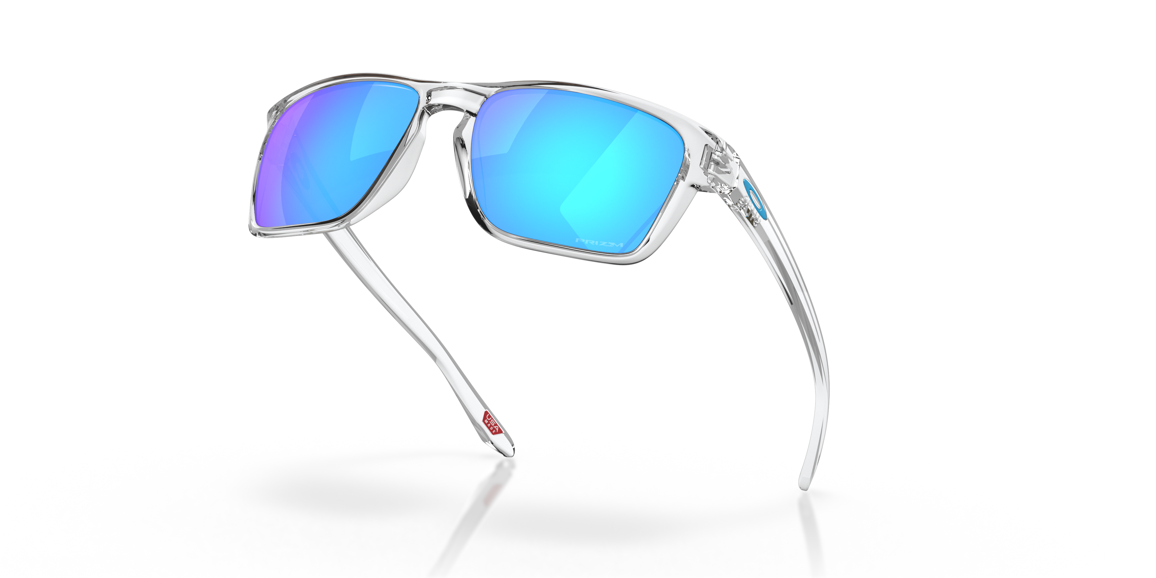 Oakley Sylas OO9448 in Polished Clear / Prizm Sapphire, angled view #Colour_Polished Clear / Prizm Sapphire