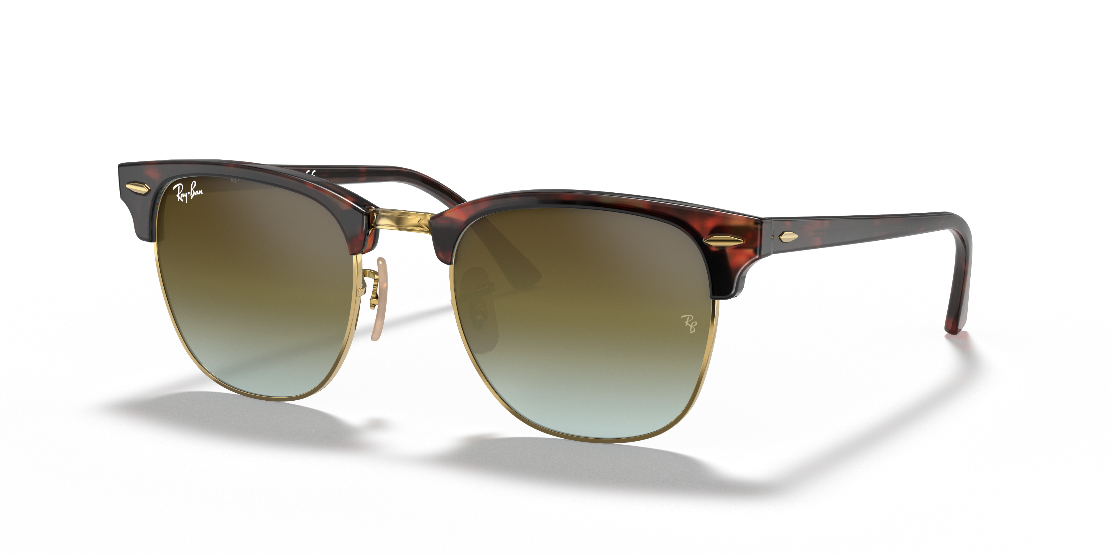 Ray-Ban Clubmaster RB3016 in Tortoise On Gold (990), three-quarter view #Colour_Tortoise On Gold (990)