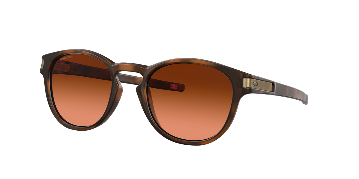 Oakley Latch OO9265 sunglasses in matte brown tortoise with a Prizm Bronze Gradient lens, three-quarter view